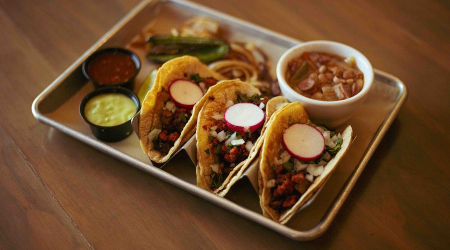 Fiesta Mexican Restaurant signature dishes Spicy Crispy Smash TacosFish TacosChoripollo